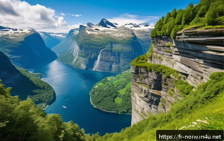 노르웨이 하이킹 코스 추천 - A breathtaking panoramic view of Geirangerfjord in Norway during summer, featuring steep cliffs cove...